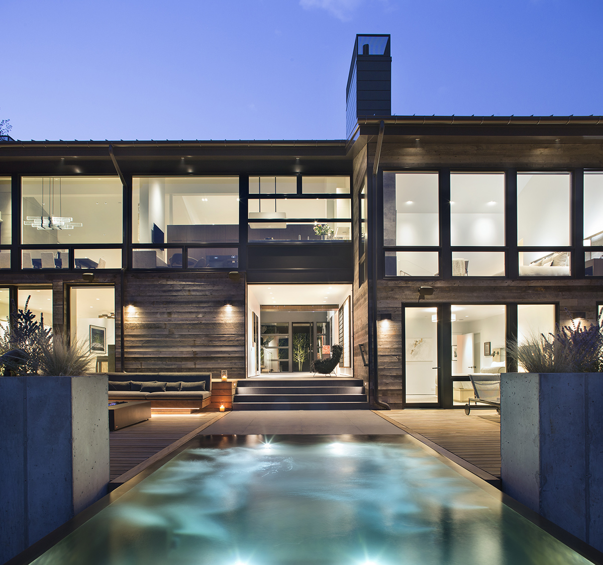 Exterior architectural design of lookout home with pool