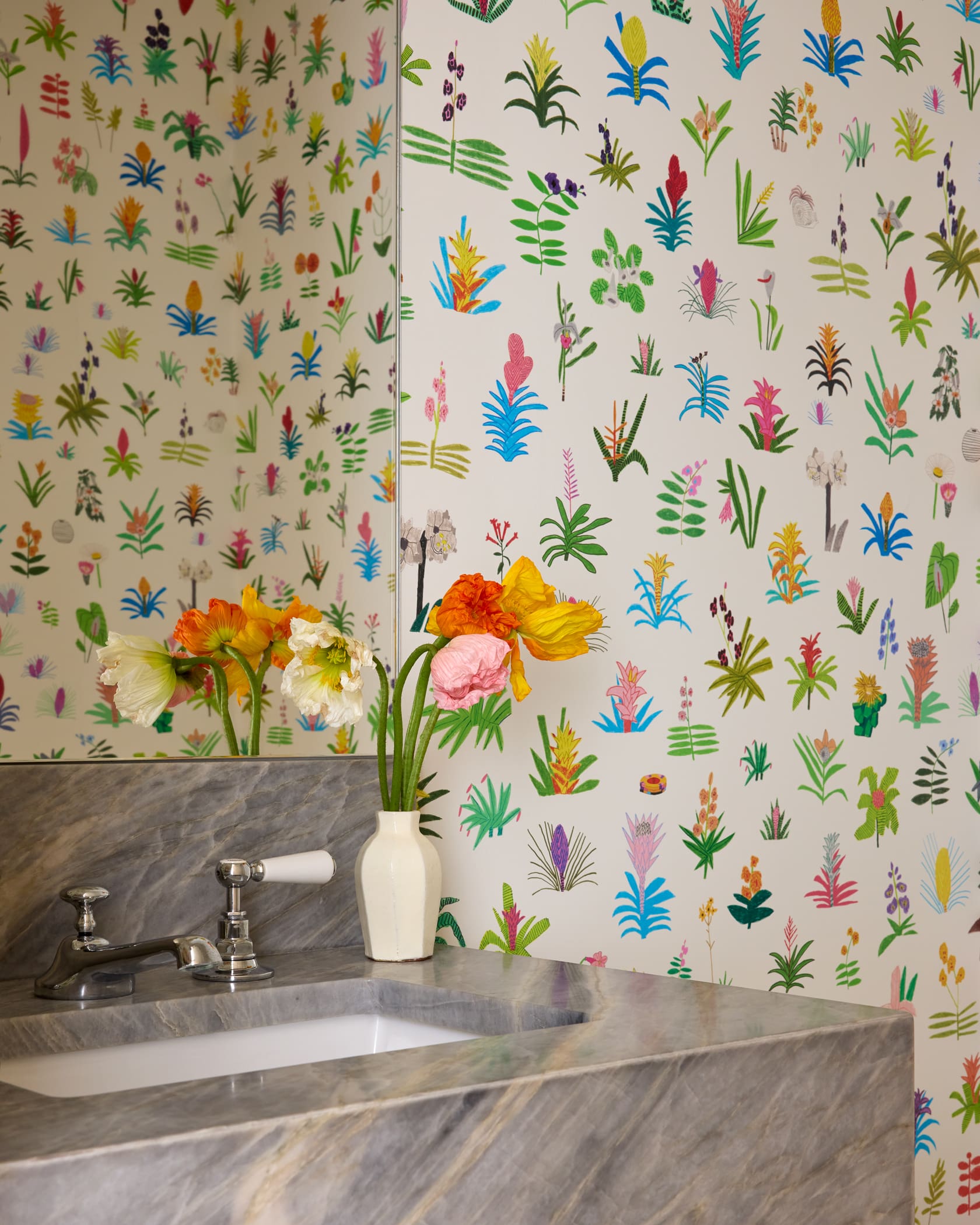 Reconfigured powder room with cohesive material palette in Blend penthouse renovation, Aspen Colorado